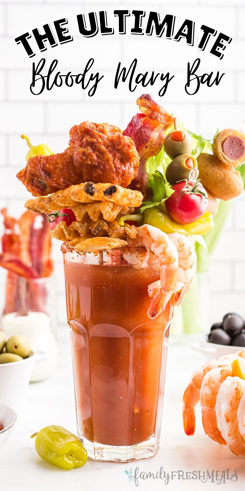 This Ultimate Bloody Mary Bar is basically an entire brunch buffet in a glass. All of your guests will love this drink station. via @familyfresh