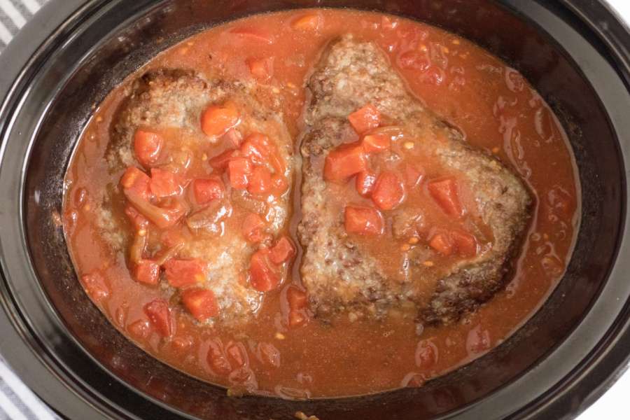 cune steaks added to gravy in slow cooker