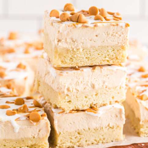 Fluffernutter Cheesecake Bars stacked on a plate