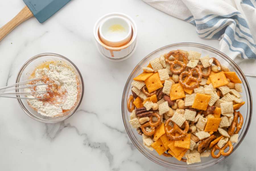 mixing together buffalo sauce, butter, and ranch