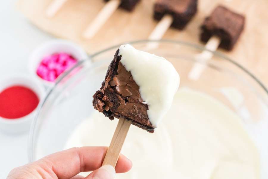 half of brownie dipped in white chocolate