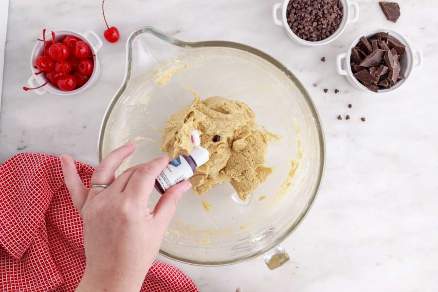 adding food coloring to dough