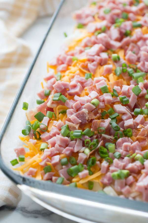 cheese ham and green onions added to casserole dish
