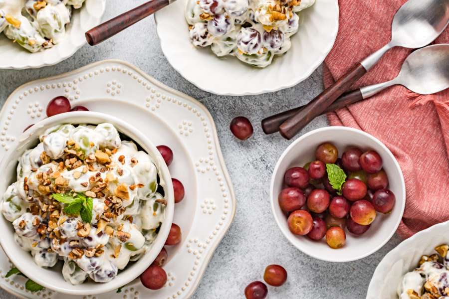 grape salad in a bowl, and on a plate