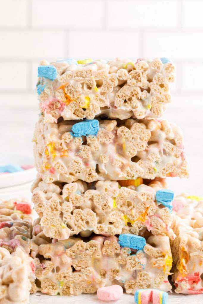 Lucky Charms Marshmallow Treats cut into squares and stacked 