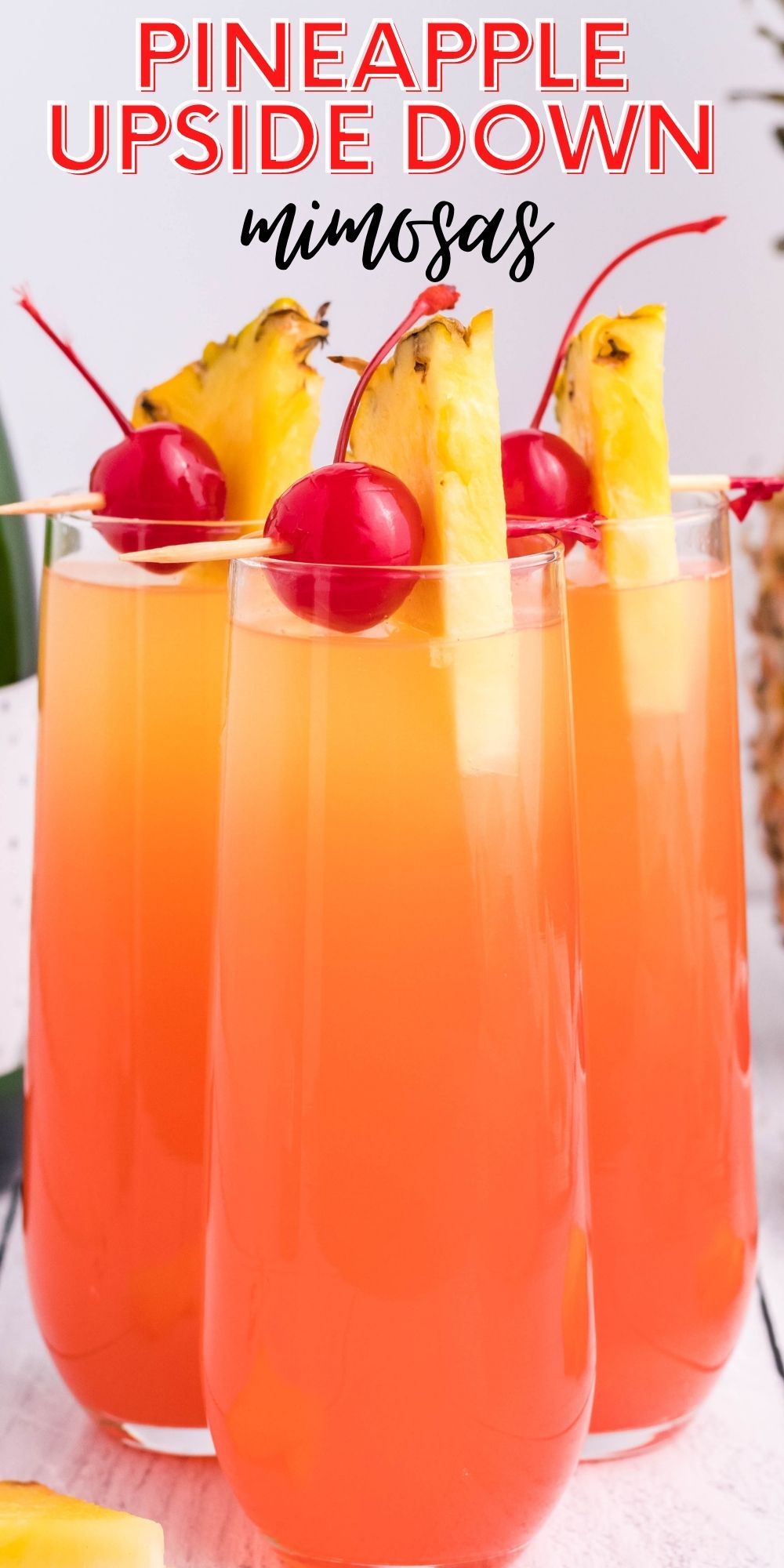 These Pineapple Upside Down Mimosas are deliciously addictive - a mix of classic mimosa and the flavors of sweet and tropical pineapple upside down cake! via @familyfresh