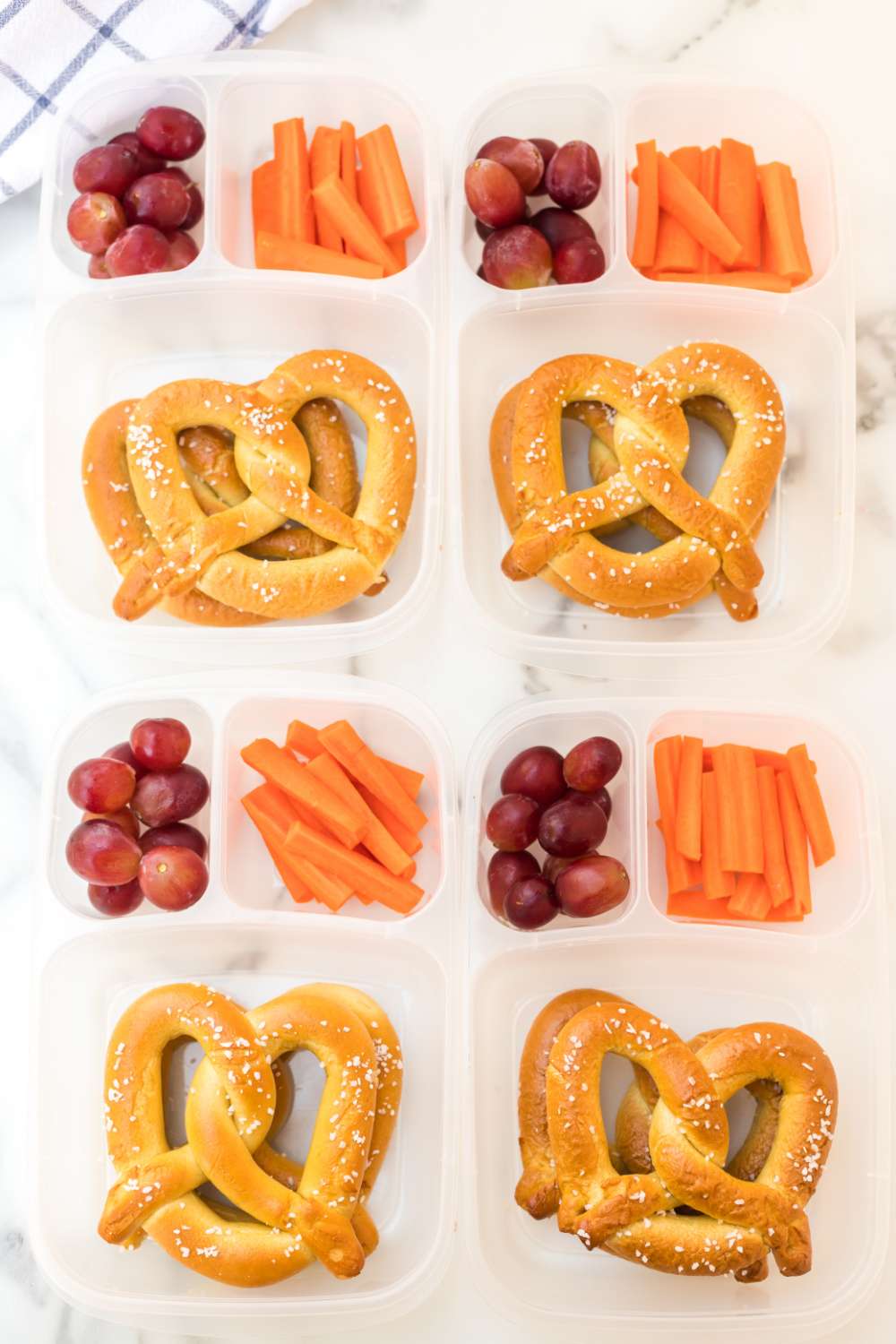This Soft Pretzel Easy Lunchbox Idea is a great idea for a light school lunch, after school snack box that both kids and adults will love. via @familyfresh