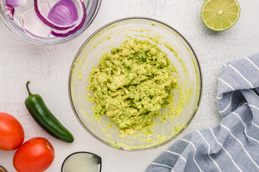 avocado mashed in a mixing bowl