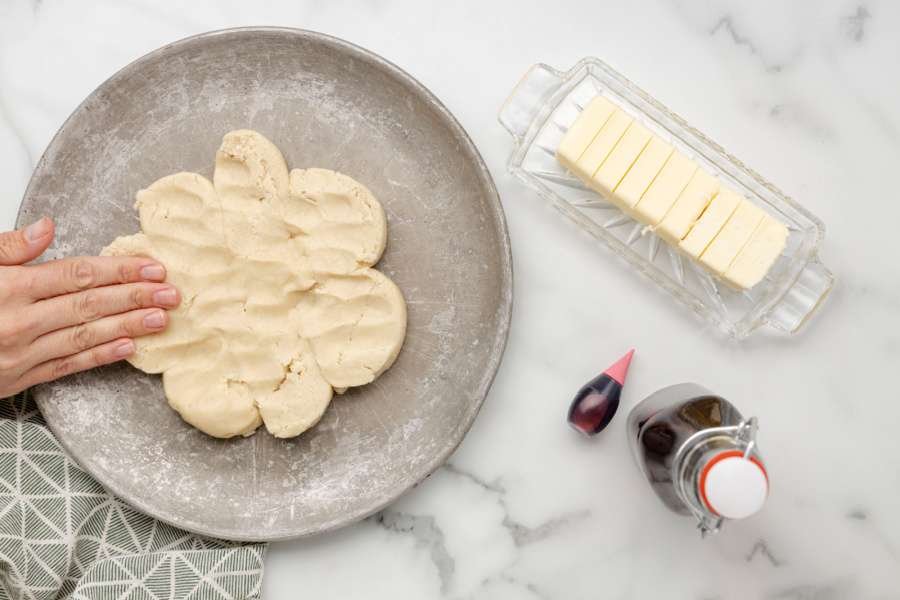 pressing cookie dough together