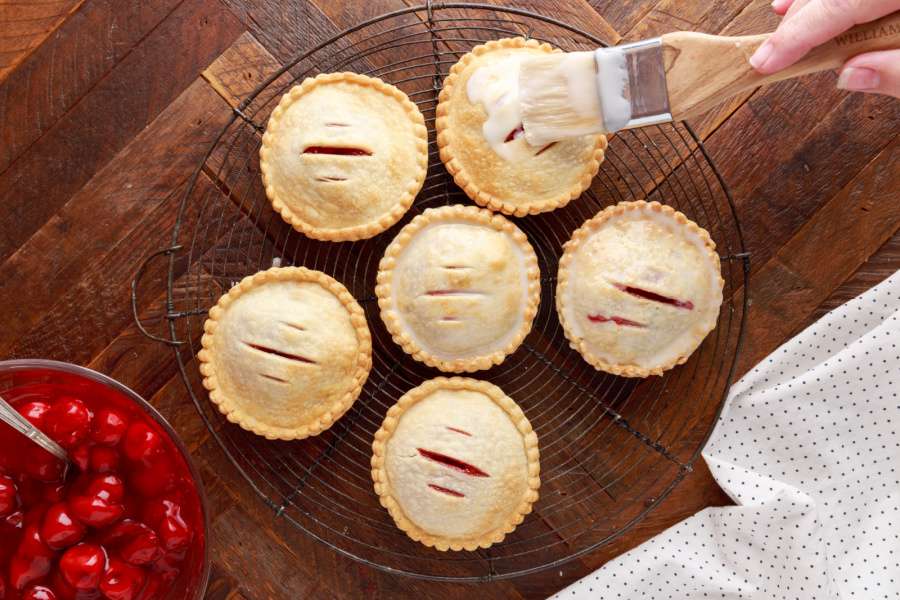 brushing tops of hand pies