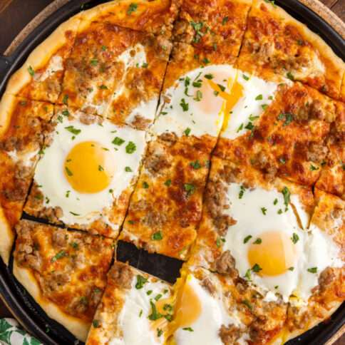 breakfast pizza cut into slices