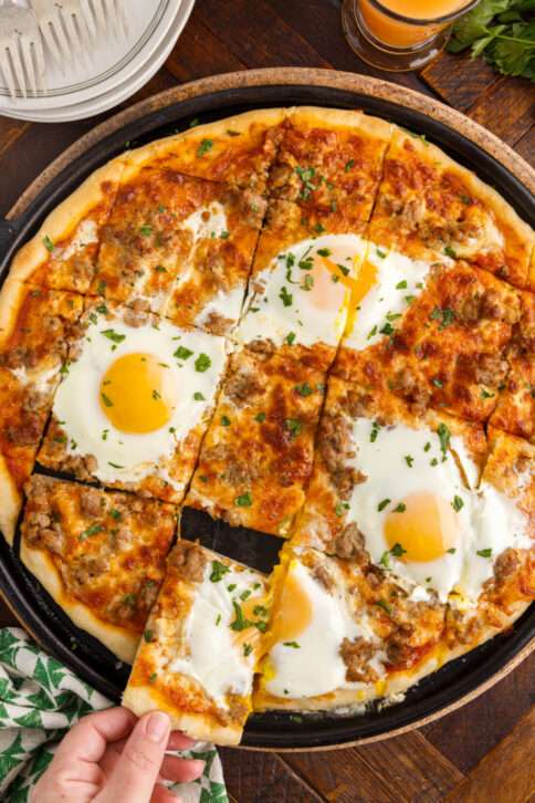 breakfast pizza cut into slices