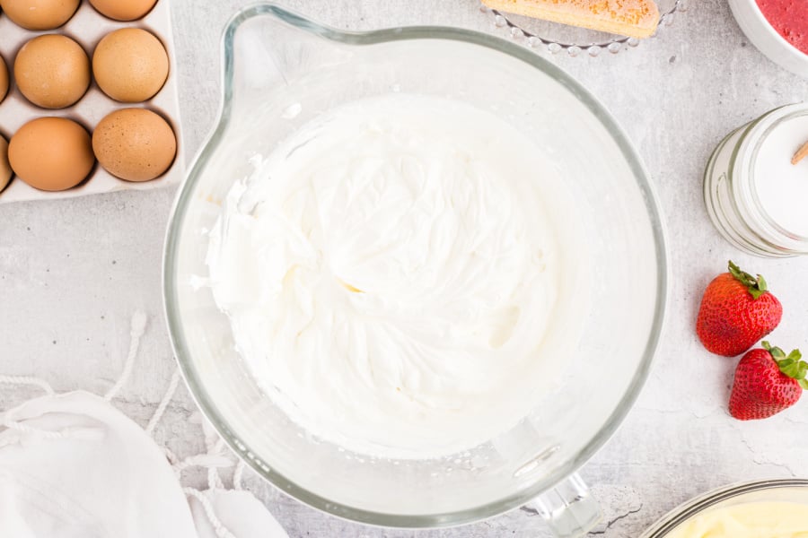 whipping cream in a mixing bowl