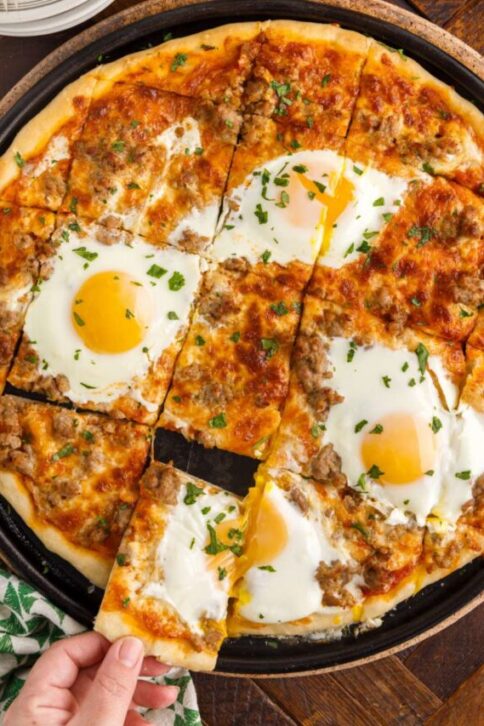 breakfast pizza cut into slices