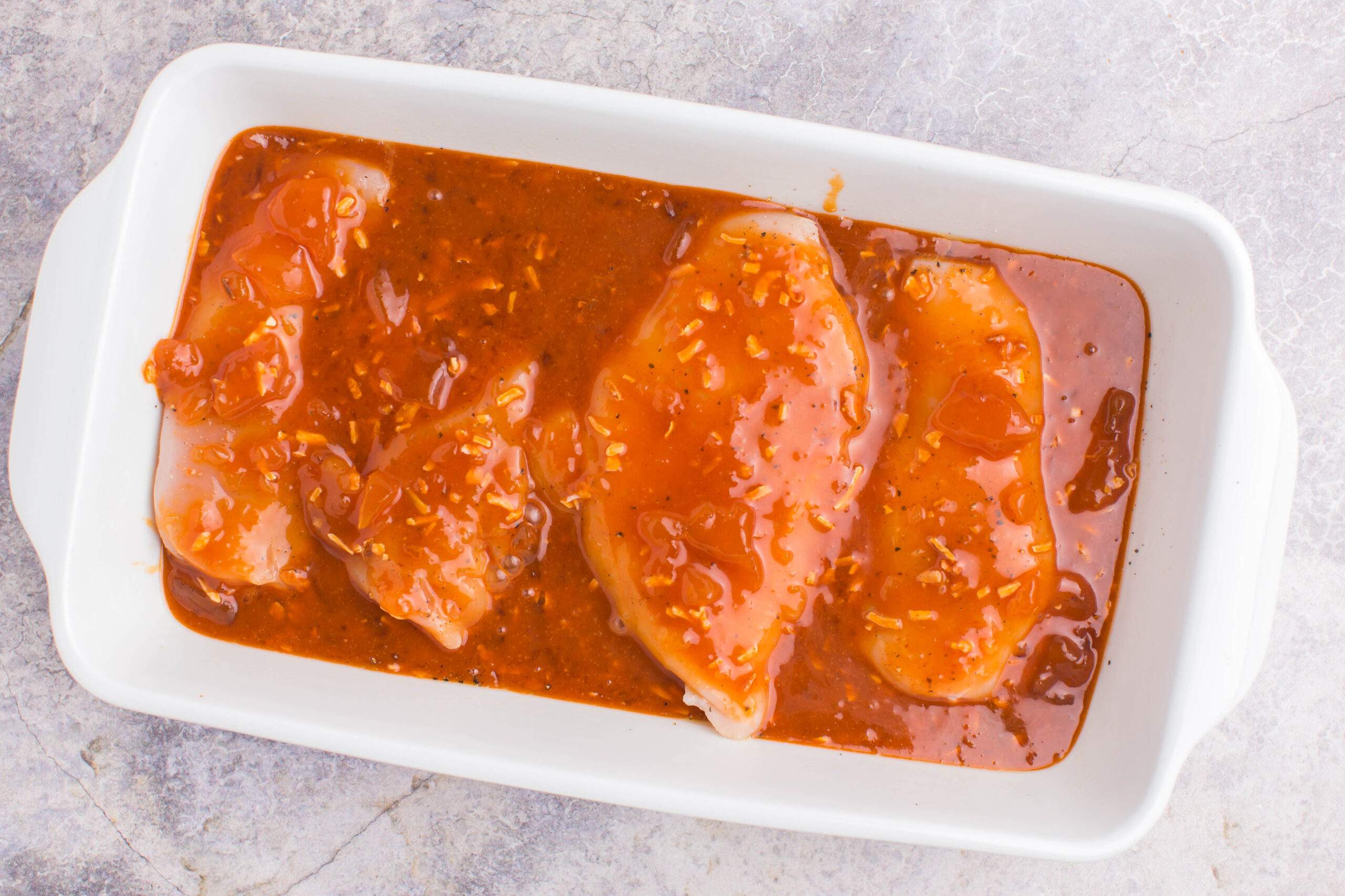 sauce poured over chicken i dish