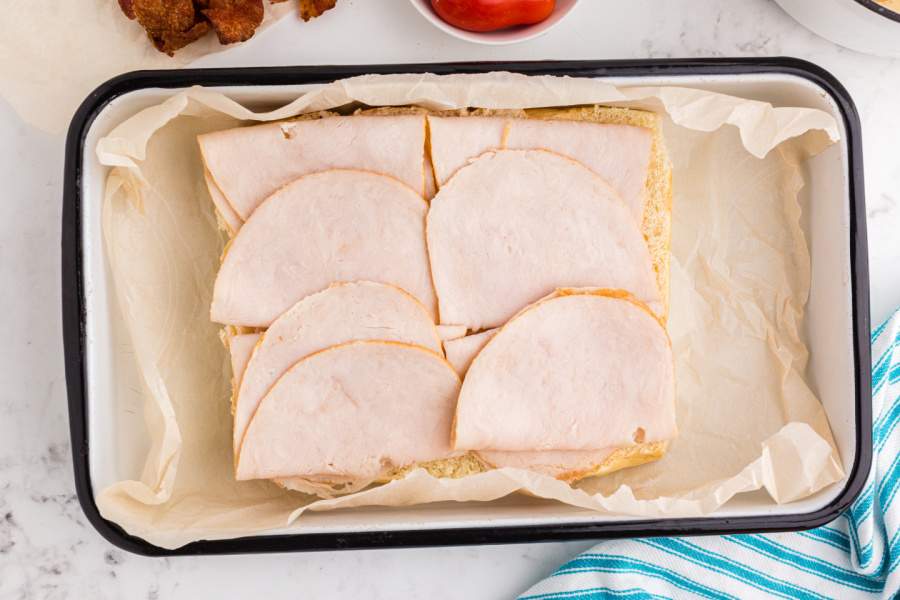 turkey slices placed on rolls