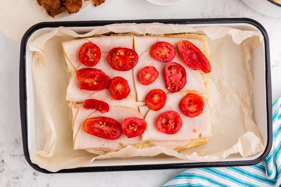 tomato slices place on top of turkey