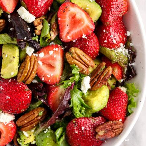 Strawberry Avocado Salad in white bowl