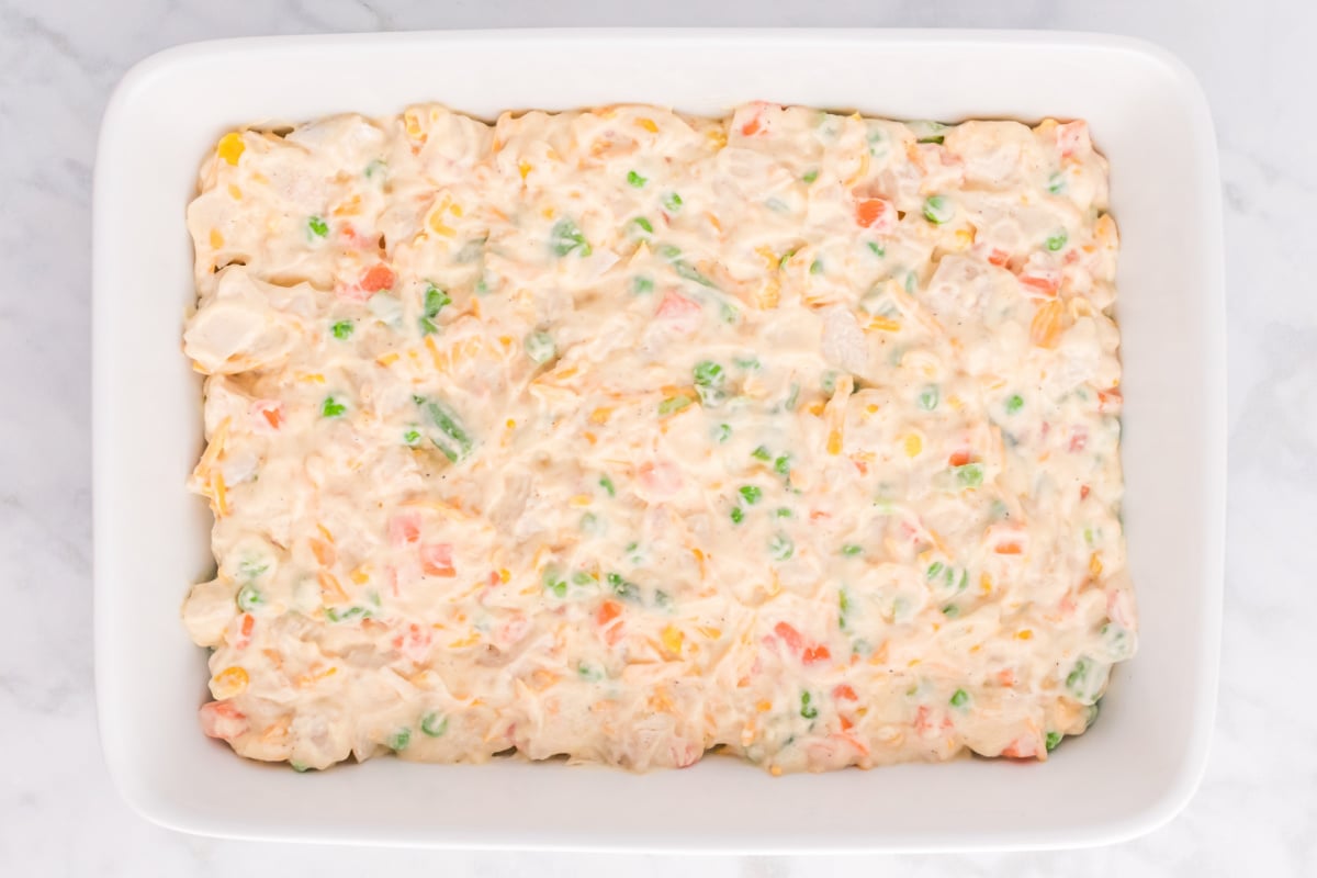 chicken pot pie mixture in baking dish