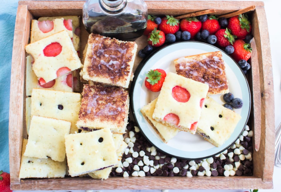 sheet pan pancakes cut up on plater and plate