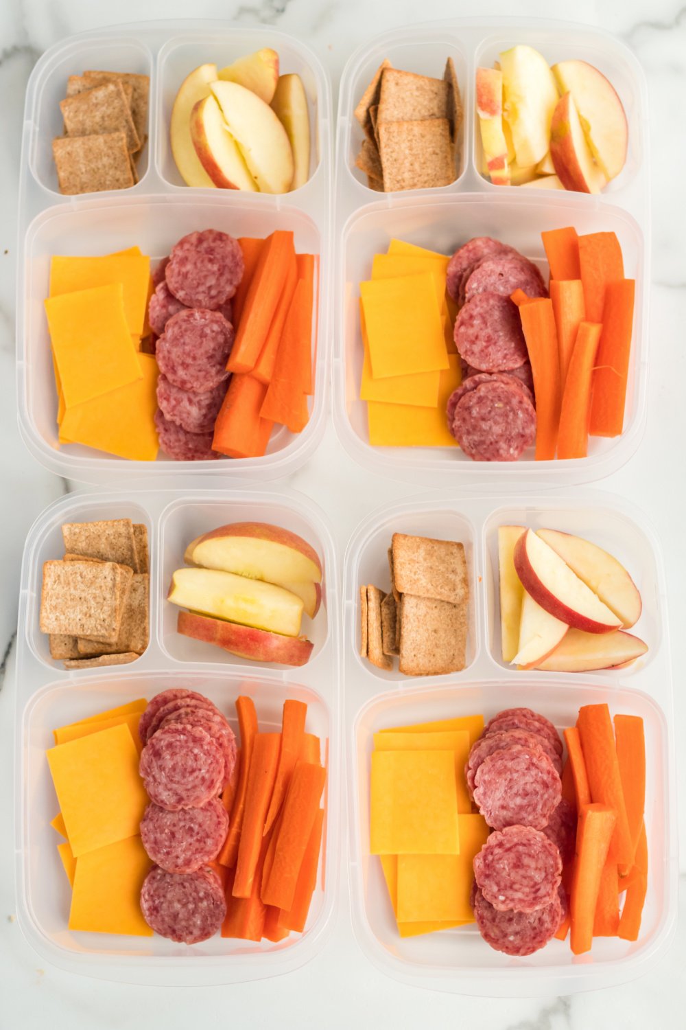 This Salami Cheese and Cracker Lunchbox Idea is full of crackers, cheese, and salami to give a protein boost to keep you full all day. via @familyfresh