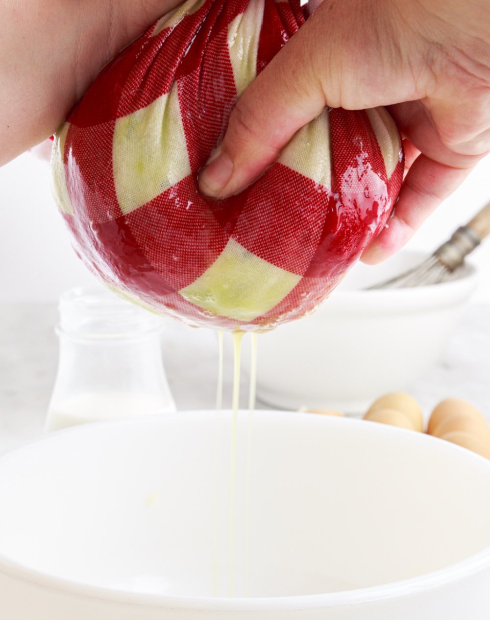 squeezing liquid out of zucchini  