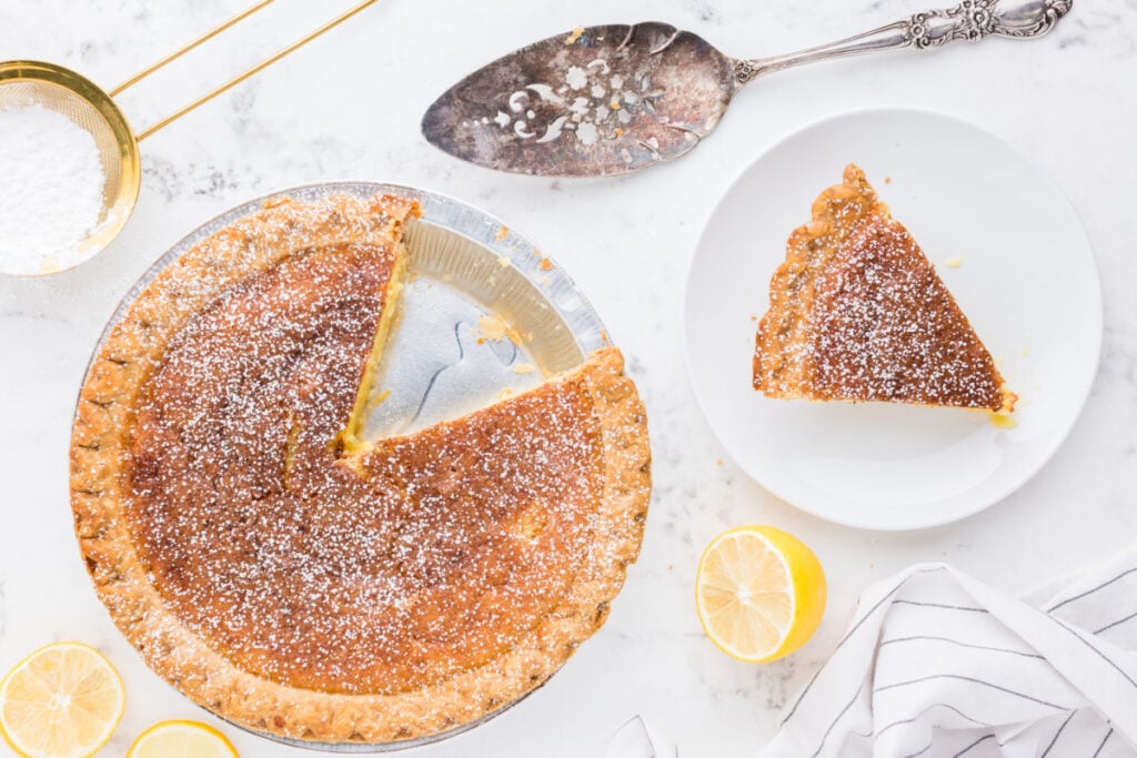 chess pie with a slice on a plate