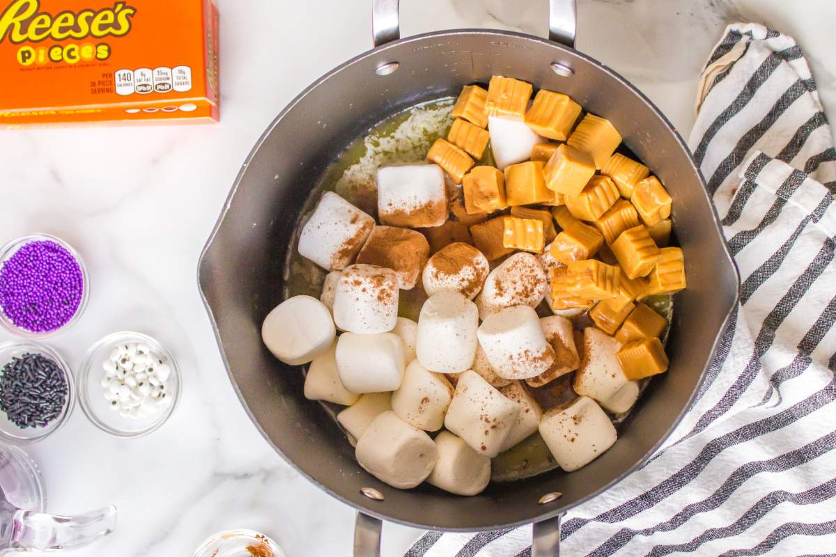 marshmallows, butter, and caramels in a pot