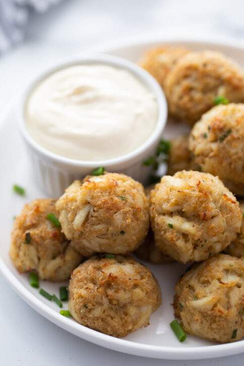 Crab Cake Balls on a plate with creamy dip