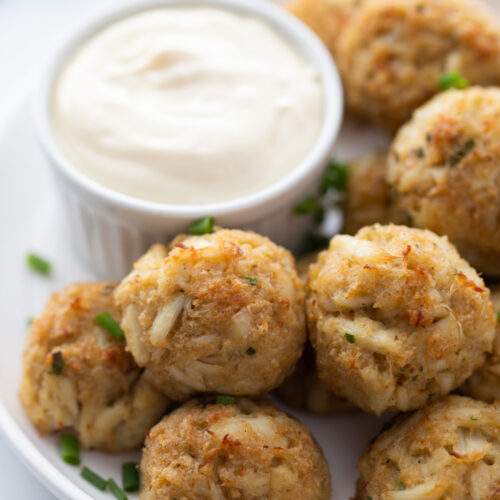 Crab Cake Balls on a plate with creamy dip