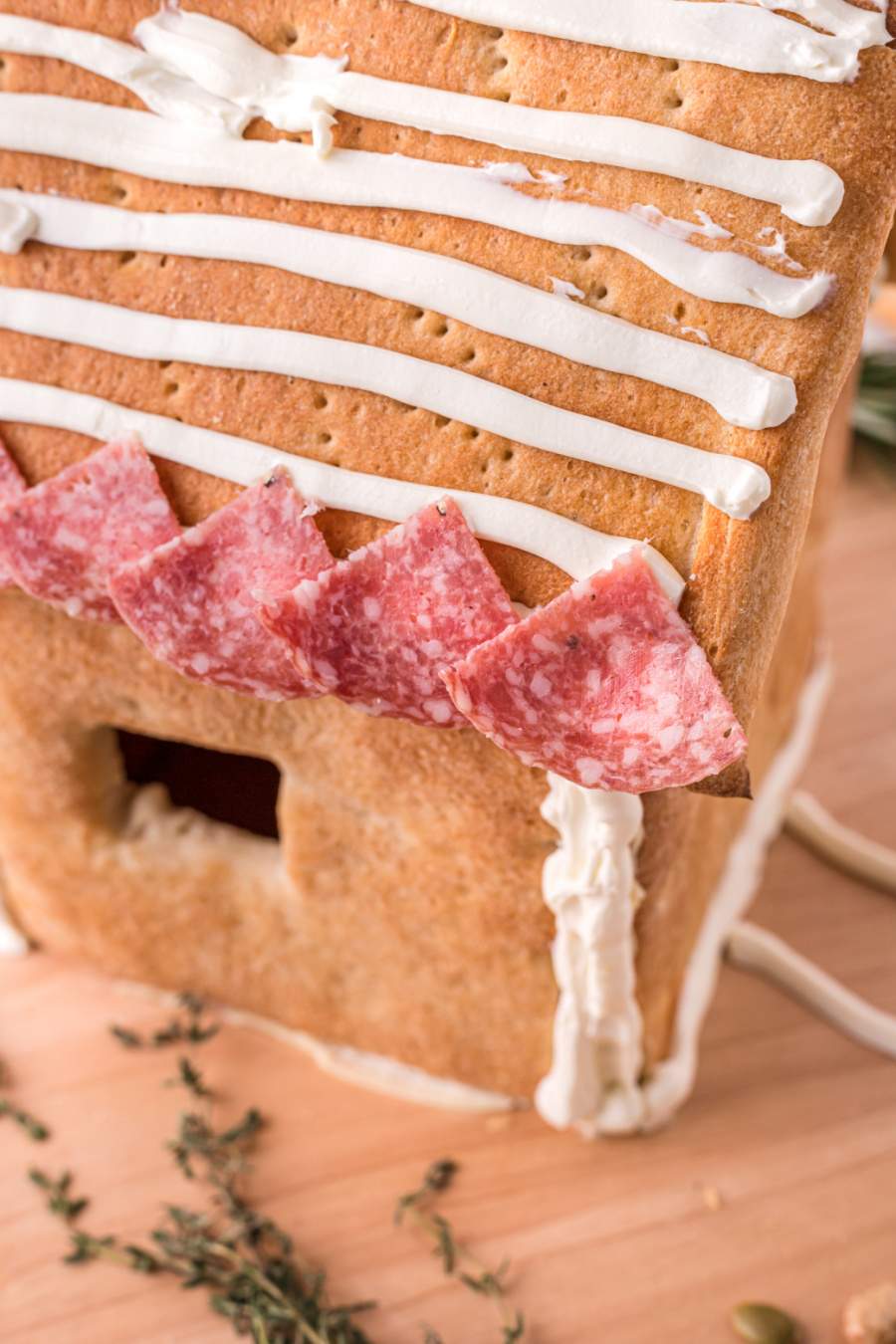 salami pieces added to top of roof crust