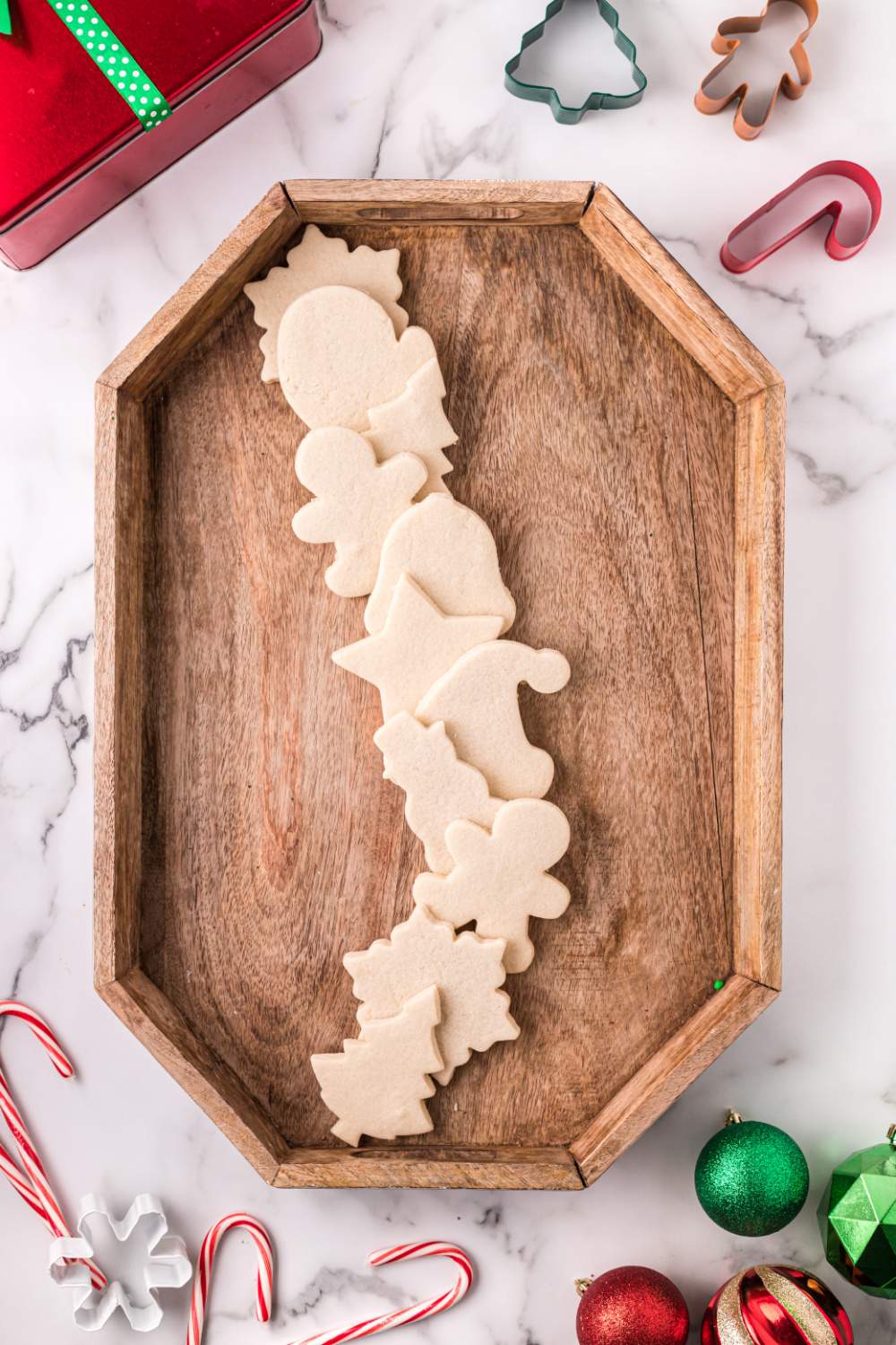 sugar cookies laid out on a board