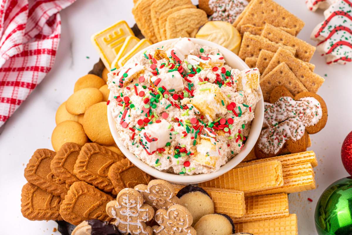 Little Debbie Christmas Tree Cake Dip in a bowl surrounded by cookies