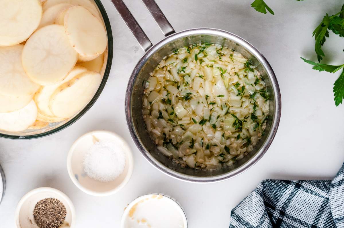 cooked onions, butter and seasoning in pot