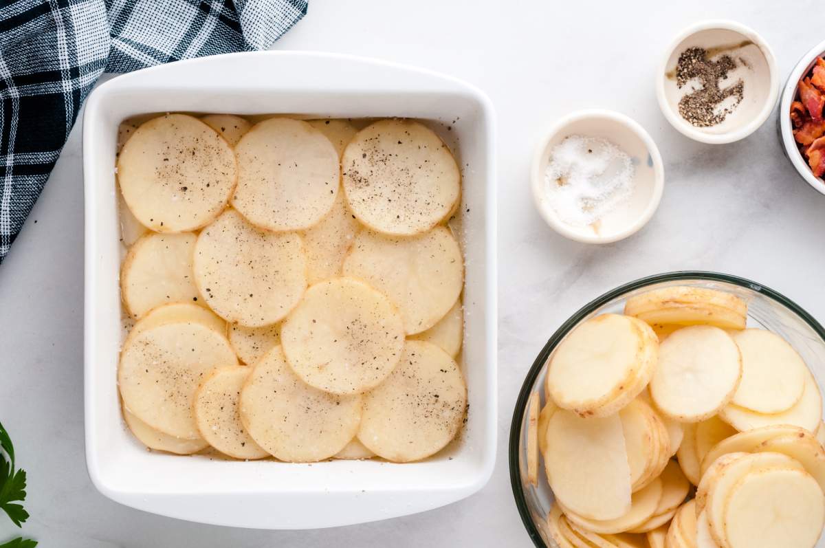 potato slices and pepper on in pan