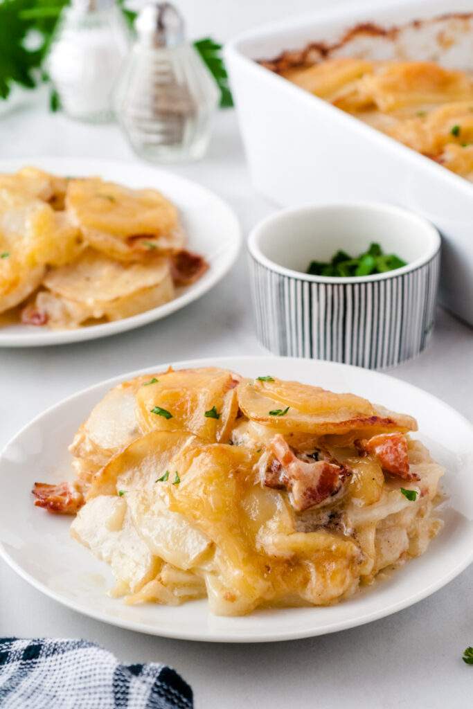 cheesy scalloped potatoes with bacon on a plate