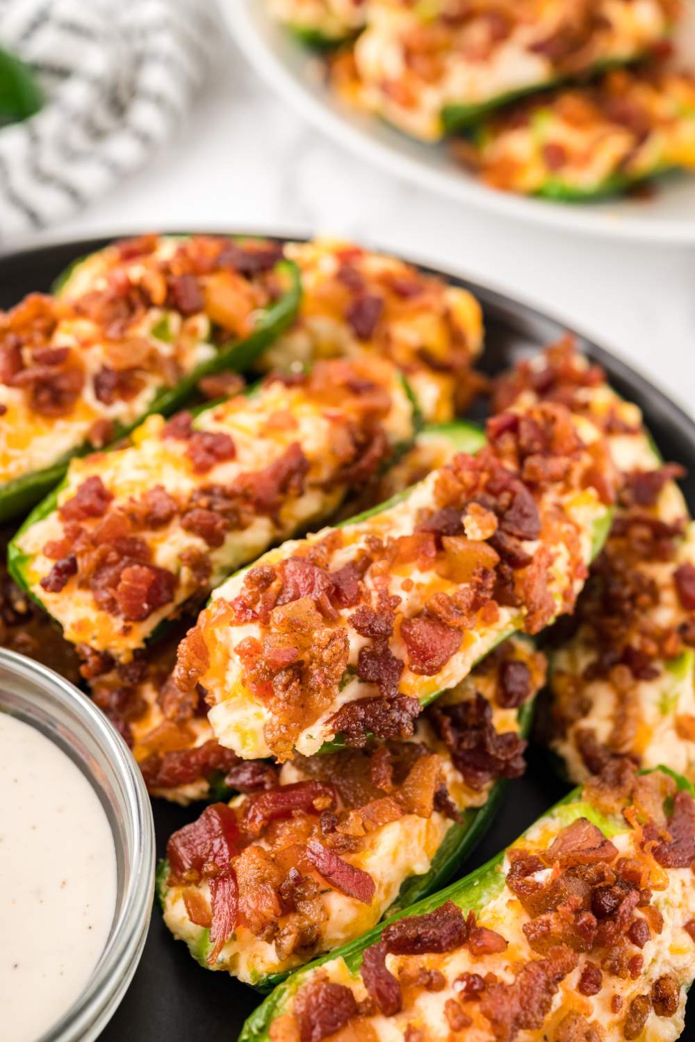 Air fryer jalapeno poppers on a plate