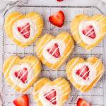 Strawberry Cream Cheese Heart Pastries on a drying rack