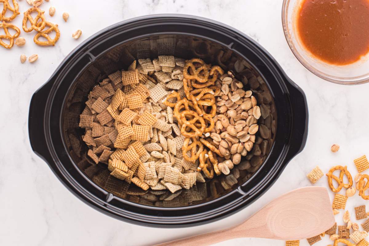 dry ingredients in crockpot for Classic Slow Cooker Chex Mix