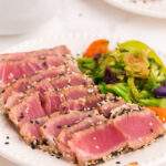 grilled ahi tuna steaks sliced on a plate