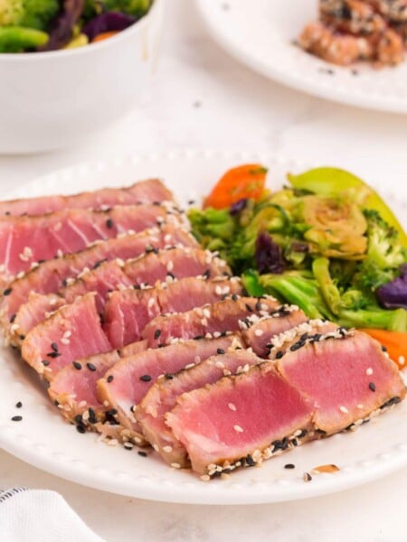 grilled ahi tuna steaks sliced on a plate