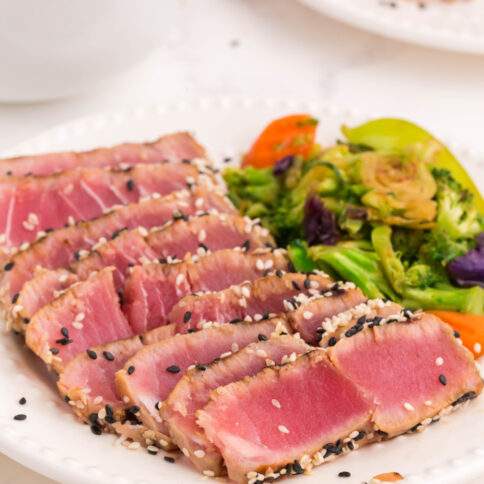 grilled ahi tuna steaks sliced on a plate