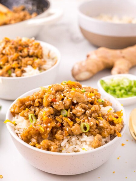 Orange Ground Chicken in bowl with rice
