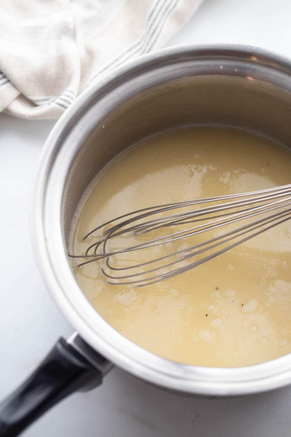 sauce for scalloped potatoes in pot