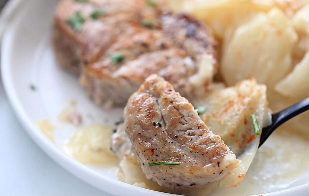 Pork Chops and Scalloped Potatoes Casserole on a plate