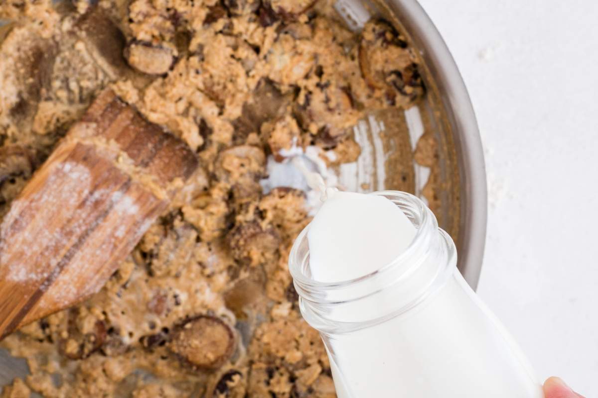 pouring milk into pan