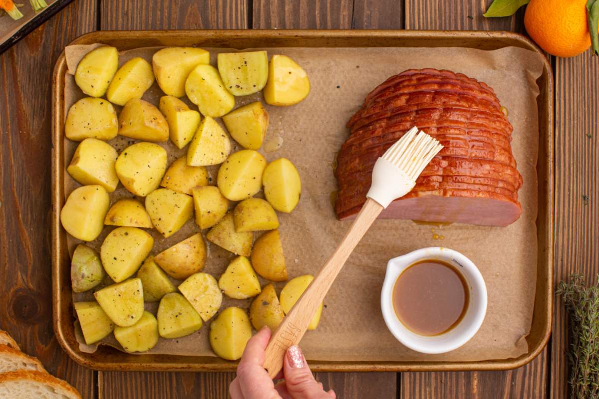 brushing ham with glaze