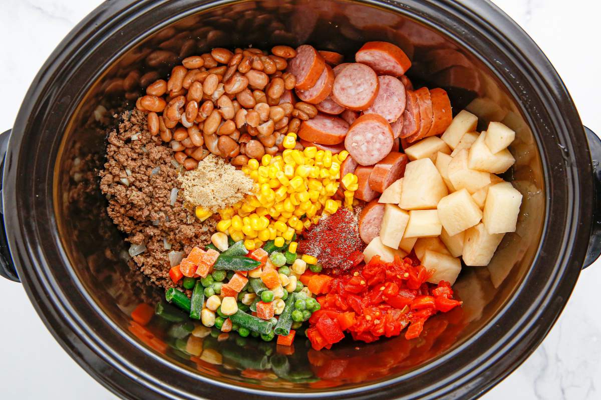 Crockpot Texas Cowboy Stew ingredients in a slow cookers