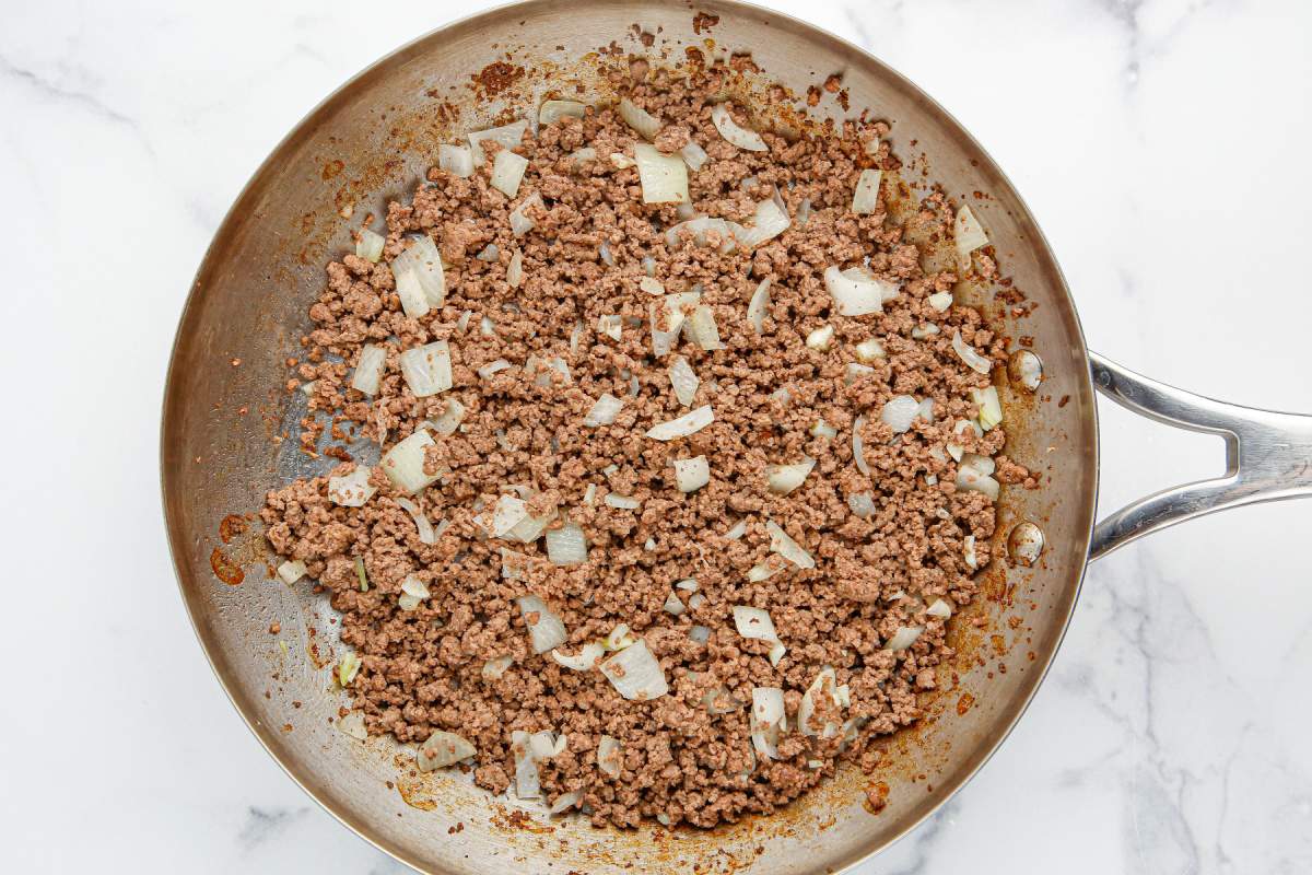 ground beef, onions and garlic in a pan