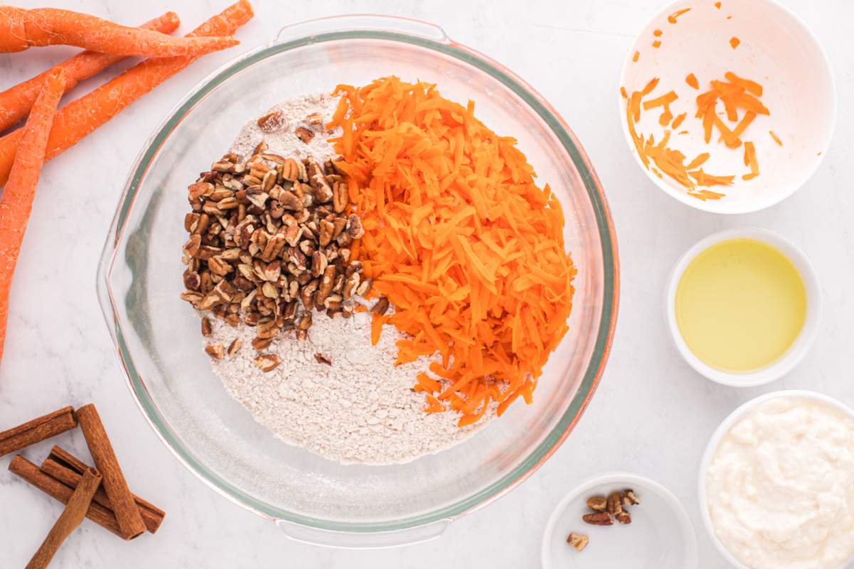 cake mix, carrots and pecans in a large mixing bowl.